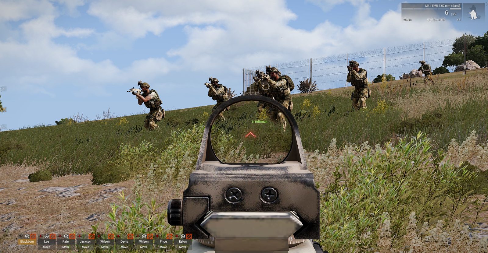 The whole squad advancing in line across open ground on Malden. In-game screenshot, Arma 3.
