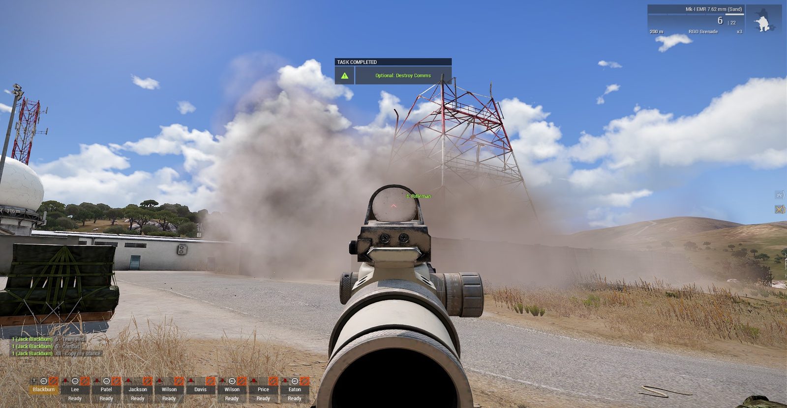 The enemy comms tower comes down — objective complete. In-game screenshot.